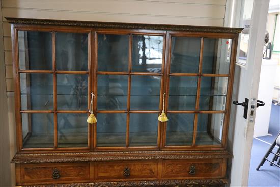 A 1930s Queen Anne revival walnut display cabinet, W.4ft 10in. D.1ft 4in. H.4ft 10.5in.